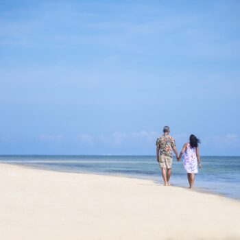 Older-Couple-on-beach-2-scaled